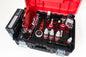 Open tool kit with various automotive tools and supplies on a white background